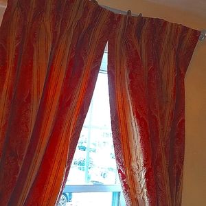 Custom made drapery. Pillows, valance and swags.